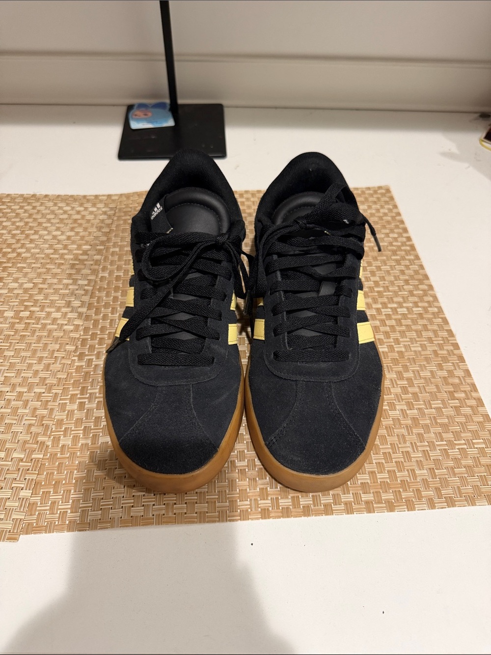 Adidas black and yellow sneakers